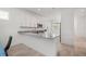 Kitchen with white cabinets, granite countertops, and stainless steel appliances at 1069 Avery Meadows Way, Deland, FL 32724