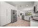 Modern kitchen with stainless steel appliances and ample cabinet space at 1069 Avery Meadows Way, Deland, FL 32724