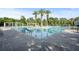 Large community pool with plenty of lounge chairs at 1069 Avery Meadows Way, Deland, FL 32724