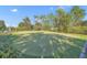 Community putting green surrounded by trees at 1069 Avery Meadows Way, Deland, FL 32724