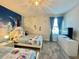 Frozen themed bedroom with two twin beds and Frozen mural at 1178 Drop Ln, Kissimmee, FL 34747