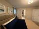 King-size bed, walk-in closet, and ensuite bathroom access at 1178 Drop Ln, Kissimmee, FL 34747