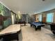Entertainment room with pool table, air hockey, and foosball at 1178 Drop Ln, Kissimmee, FL 34747