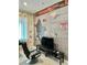 Gaming area with comfortable chair and large TV at 1178 Drop Ln, Kissimmee, FL 34747