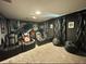 Star Wars themed home theater with comfy reclining seats and large screen at 1178 Drop Ln, Davenport, FL 33896