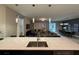 Modern kitchen with island, stainless steel appliances, and open layout at 1178 Drop Ln, Kissimmee, FL 34747