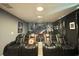 Home theater with reclining seats and Star Wars decor at 1178 Drop Ln, Kissimmee, FL 34747