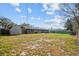 Spacious backyard with shed and wooden fence at 1201 Carol Ave, Auburndale, FL 33823