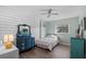 Charming bedroom with a full-size bed and white accent wall at 1201 Carol Ave, Auburndale, FL 33823