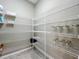 A well-organized pantry features wire shelving, maximizing storage space and accessibility at 13870 Jomatt Loop, Winter Garden, FL 34787