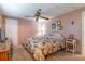 Spacious bedroom with a dresser and ceiling fan at 151 E Plantation Blvd, Lake Mary, FL 32746