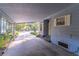 Covered carport with view of the front door and street at 151 E Plantation Blvd, Lake Mary, FL 32746