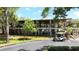 Modern community center with large windows and golf cart at 151 E Plantation Blvd, Lake Mary, FL 32746