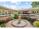 Community courtyard with fountain and lush landscaping at 151 E Plantation Blvd, Lake Mary, FL 32746