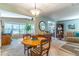 Bright dining area with a round table and view of adjacent living spaces at 151 E Plantation Blvd, Lake Mary, FL 32746