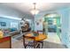 Casual dining area with open views to the kitchen and living room at 151 E Plantation Blvd, Lake Mary, FL 32746