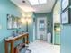 Inviting entryway with built-in storage and a charming accent wall at 151 E Plantation Blvd, Lake Mary, FL 32746