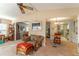 Open concept living area featuring a seating area and dining space at 151 E Plantation Blvd, Lake Mary, FL 32746