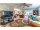 Bright living room with ample natural light and comfy seating at 151 E Plantation Blvd, Lake Mary, FL 32746