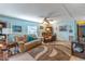 Relaxing living room, featuring a ceiling fan and large windows at 151 E Plantation Blvd, Lake Mary, FL 32746