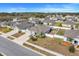 Single-Gathering home with two-car garage and fenced backyard at 15267 Aquarius Way, Mascotte, FL 34753