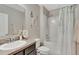 Clean bathroom with shower/tub combo and vanity at 15267 Aquarius Way, Mascotte, FL 34753