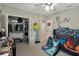 bedroom with a dinosaur theme and built in bunk bed at 15267 Aquarius Way, Mascotte, FL 34753