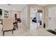 Open dining area with table and chairs, view into bedroom beyond at 15267 Aquarius Way, Mascotte, FL 34753
