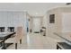 Bright and spacious entryway with decorative wall and console table at 15267 Aquarius Way, Mascotte, FL 34753