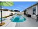 Relaxing backyard pool with patio and landscaping at 15267 Aquarius Way, Mascotte, FL 34753