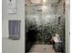 Large walk-in shower with glass enclosure and mosaic tile at 15267 Aquarius Way, Mascotte, FL 34753