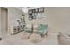 Charming sitting area with comfortable armchairs and ottomans at 15267 Aquarius Way, Mascotte, FL 34753