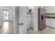 Open pantry with wire shelving next to a stainless steel refrigerator at 1529 Isleta Loop, Kissimmee, FL 34741