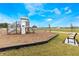 Community playground with playset and benches nearby at 1537 Isleta Loop, Kissimmee, FL 34741