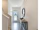 Modern entryway with tile flooring and a console table at 1541 Isleta Loop, Kissimmee, FL 34741