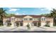 Three-unit townhouse building with attached garages and landscaping at 1541 Isleta Loop, Kissimmee, FL 34741