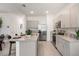 Modern kitchen with stainless steel appliances and granite countertops at 1541 Isleta Loop, Kissimmee, FL 34741