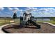 Modern playground with slide and climbing wall at 1543 Isleta Loop, Kissimmee, FL 34741