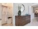 Main bedroom with dresser and access to hallway at 1545 Isleta Loop, Kissimmee, FL 34741