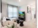 Comfortable Gathering room with sectional sofa and TV at 1547 Isleta Loop, Kissimmee, FL 34741