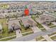 Aerial view of the property showcasing its location within a residential neighborhood at 1882 Rustic Falls Dr, Kissimmee, FL 34744