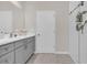 Spacious bathroom with double vanity and shower at 206 Piave St, Haines City, FL 33844