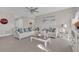 Living room with beige sofa, coffee table, and decorative accents at 206 Piave St, Haines City, FL 33844