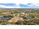 Aerial view of property with pond and equestrian facilities at 2140 W State Road 46, Geneva, FL 32732