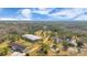Aerial view of property showing house, arena, and paddocks at 2140 W State Road 46, Geneva, FL 32732