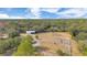 Aerial view of property with paddocks and barn at 2140 W State Road 46, Geneva, FL 32732