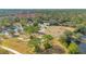 Aerial view of expansive equestrian property with paddocks, barn, and ponds at 2140 W State Road 46, Geneva, FL 32732