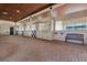 Well-maintained barn stalls featuring brick floors and wooden ceilings at 2140 W State Road 46, Geneva, FL 32732