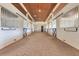 Clean and organized barn stalls with brick floors and wooden ceilings at 2140 W State Road 46, Geneva, FL 32732