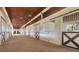 Spacious barn stalls with brick flooring and wood ceilings at 2140 W State Road 46, Geneva, FL 32732